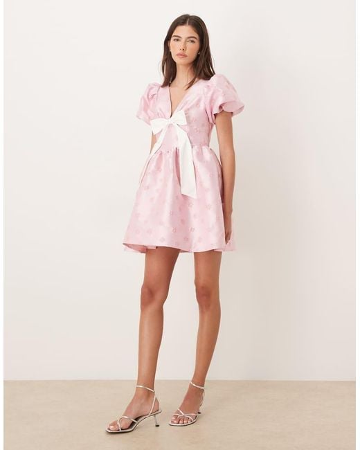 Sister Jane Pink Exclusive V Neck Puff Sleeve Bow Mini Dress