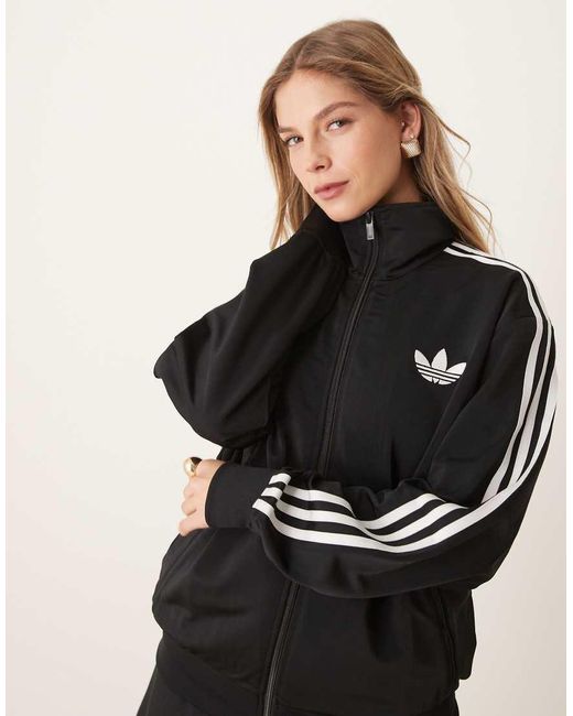 Firebird di Adidas Originals in Black