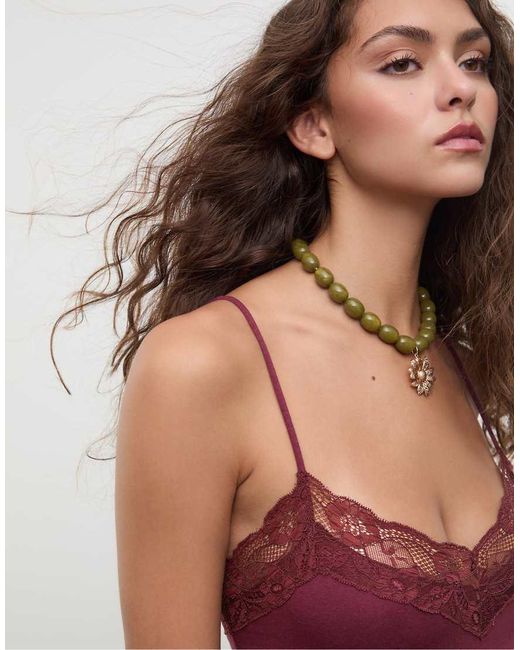 Body di Stradivarius in Brown