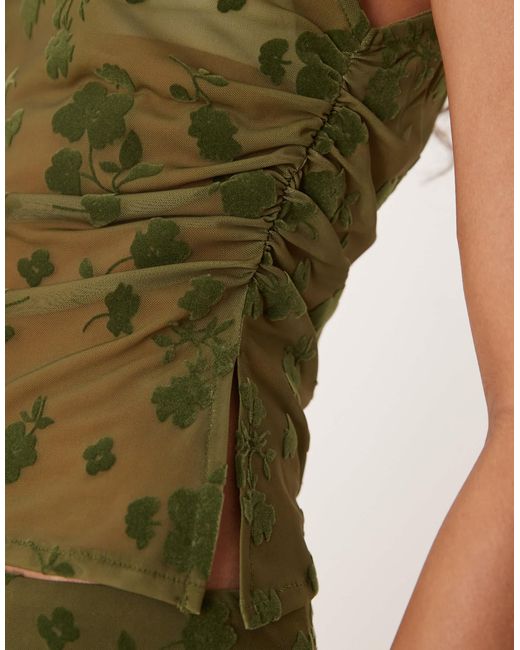 Top d'ensemble sans manches transparent à col montant et motif fleuri floqué - olive ASOS en coloris Green