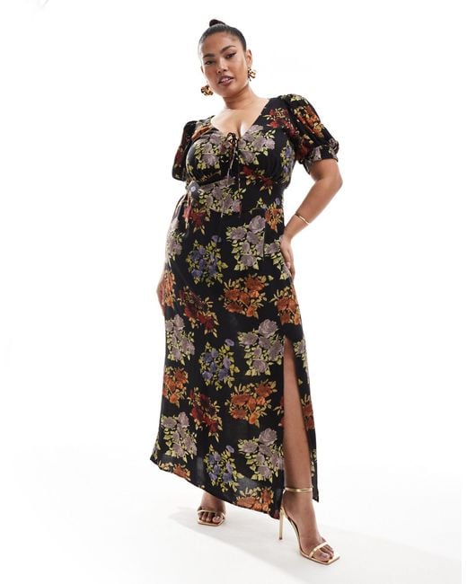 Asos design curve - robe mi-longue à manches bouffantes et imprimé fleurs vintage avec liens noués devant - noir ASOS en coloris Multicolor
