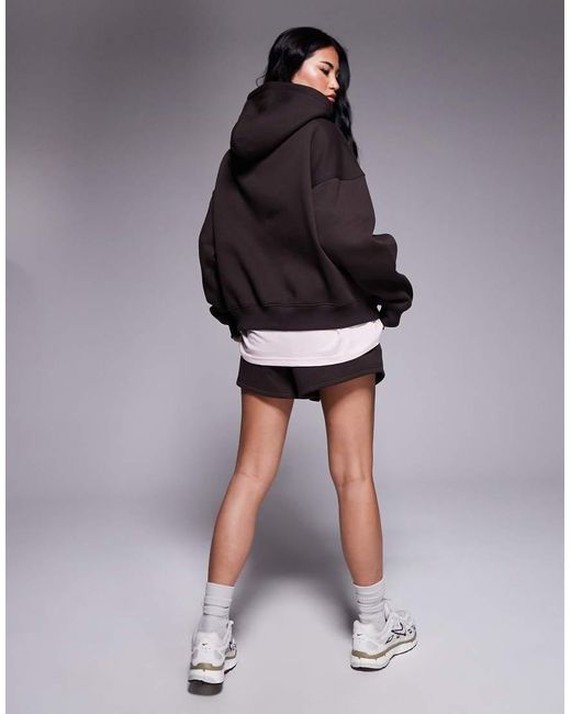 Felpa Oversize Con Cappuccio Cioccolato Con Logo Ricamato di Kaiia in Black