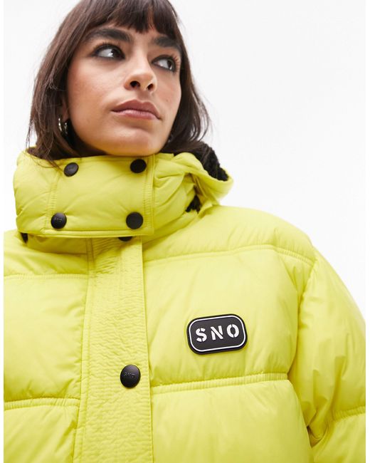 Sno Ski Hooded Puffer Jacket in Metallic Lyst