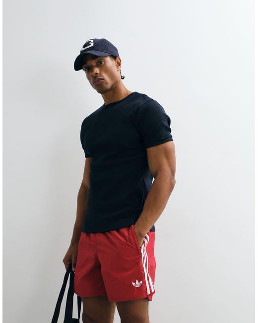Adidas Originals Red Three Stripe Sprinter Shorts for men