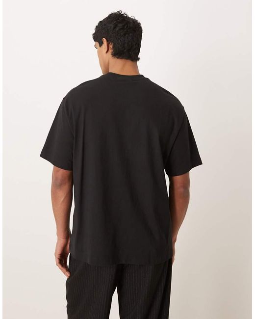 Calvin Klein Black Elevated Bold Centre Front Stitch Logo T-shirt for men