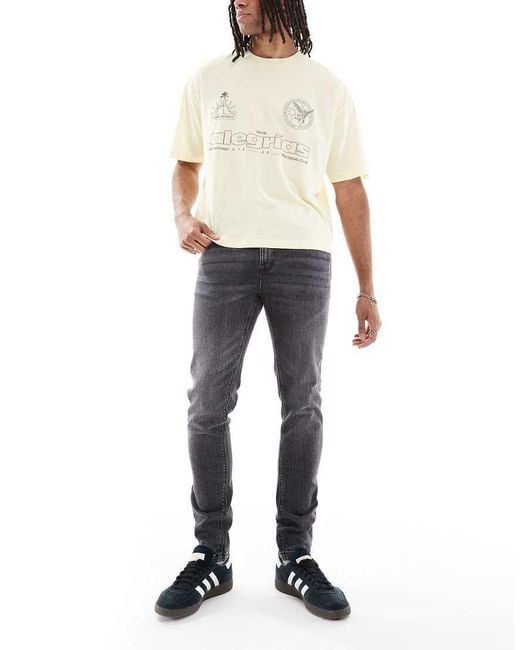 Jeans Skinny Délavé di ASOS in Natural da Uomo