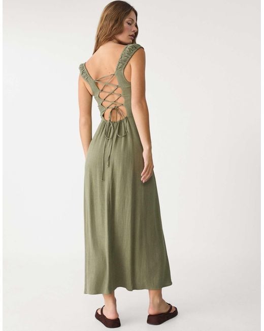 Robe longue en lin mélangé avec liens croisés dans le dos - kaki Stradivarius en coloris Green
