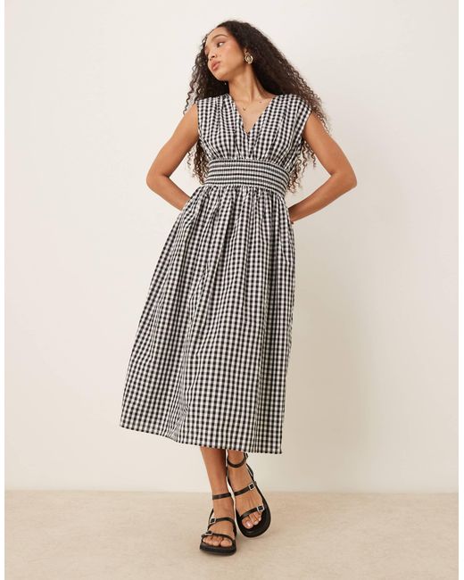 Robe mi-longue à carreaux avec taille froncée - noir et blanc Y.A.S en coloris Multicolor