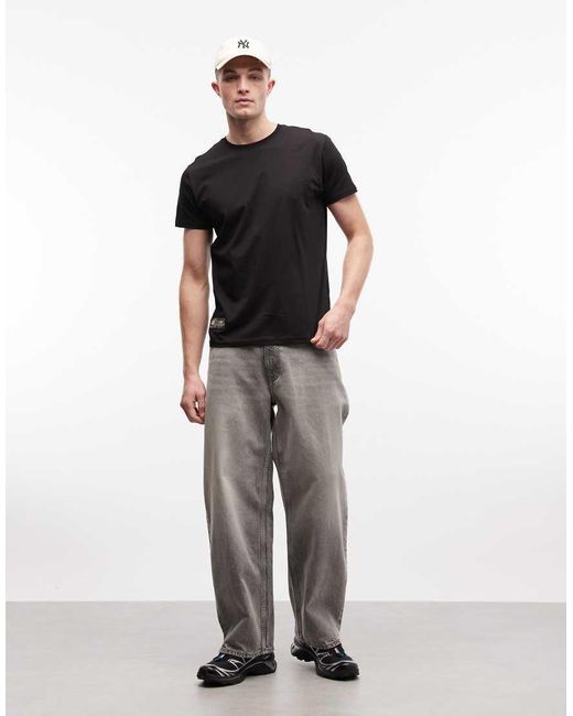 Alpha Industries Black T-shirt With Camo Label Back Print for men