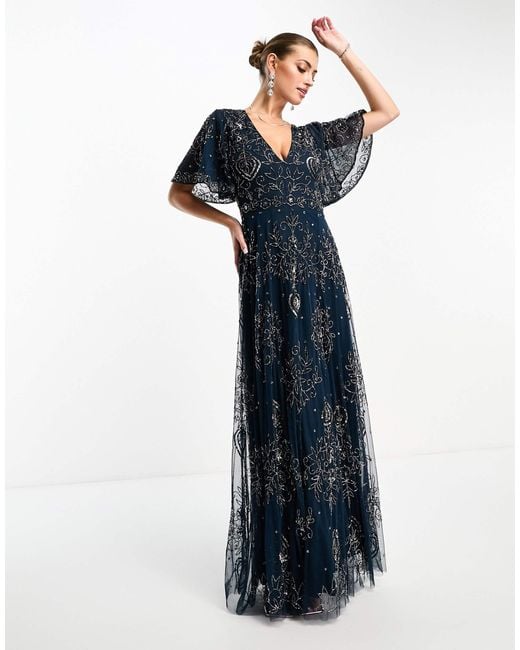 Beauut Blue Embellished Maxi Dress With Flutter Sleeve And Keyhole Back