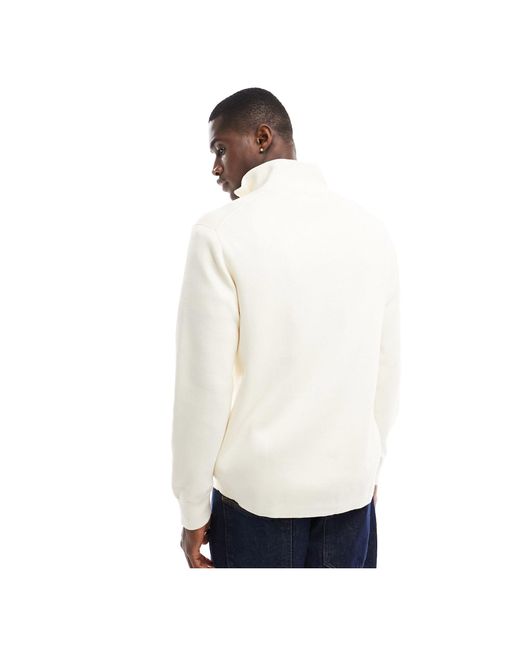 Maglione color panna con riga con logo e collo a lupetto con zip di Tommy Hilfiger in White da Uomo
