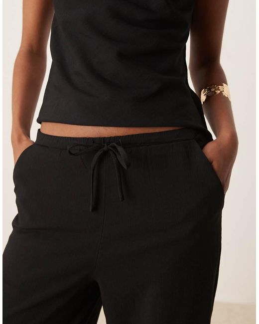 Pantalones Negros De Pernera Recta Con Lazada En La Cintura De Poliamida De (Parte De Un Conjunto) Mango de color Natural