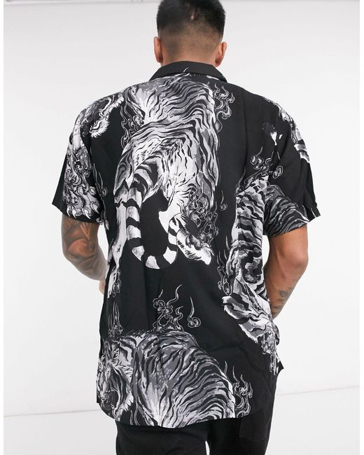 Chemise à imprimé tigres Synthétique Bershka pour homme en coloris Noir |  Lyst
