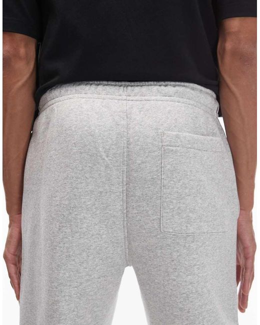 Joggers Grises Con Bajos Ajustados De Felpa De Nike de hombre de color Black