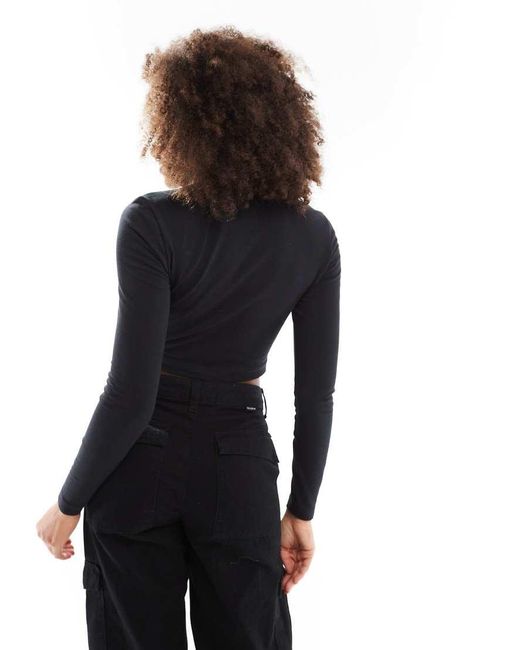 Nike Black Trend Logo Long Sleeve Cropped Top