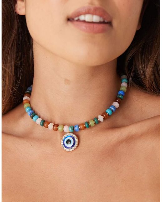 Collar Corto Con Charm De Ojo Turco Y Cuentas Multicolores Sintéticas De ASOS de color Natural