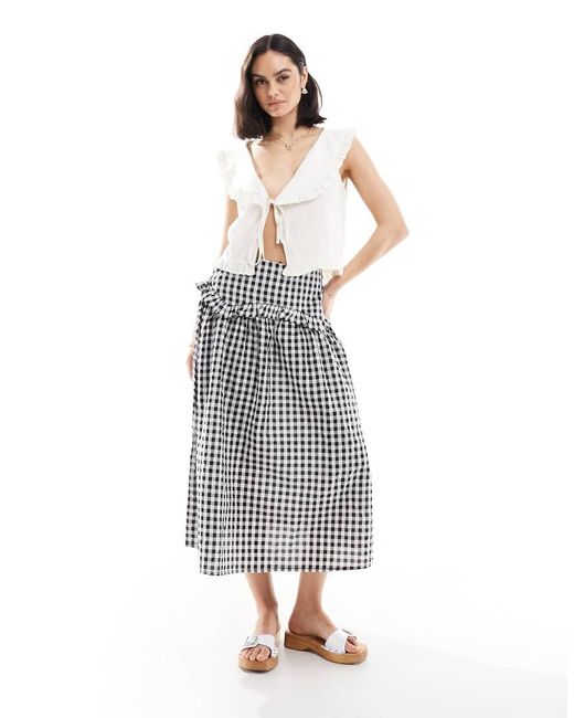 Gonna Midi Nera A Quadretti Con Volant di Wednesday's Girl in White