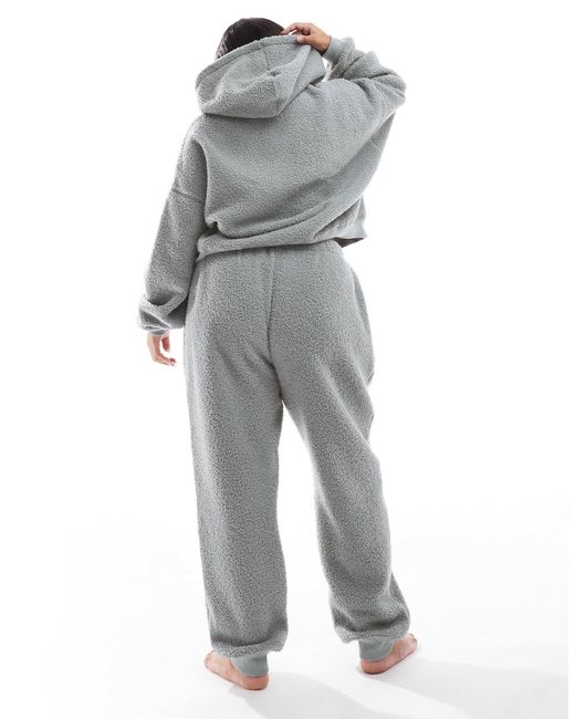 Asos design curve - ensemble confort avec sweat à capuche oversize et pantalon ASOS en coloris Blue