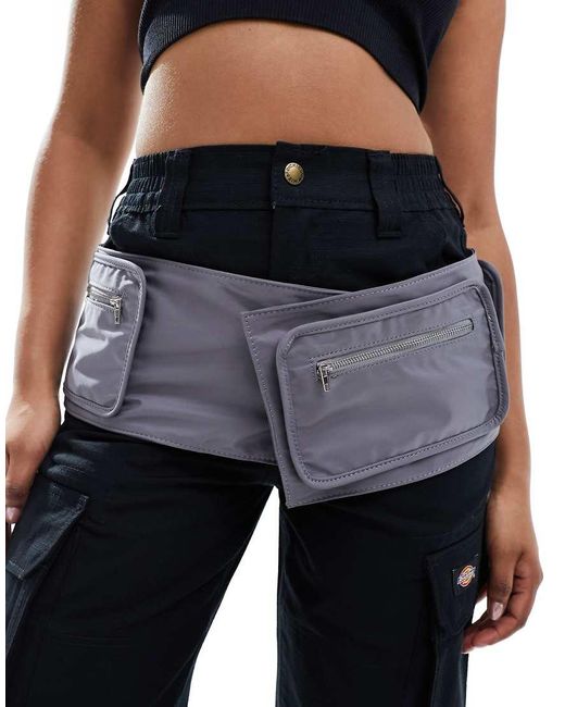Rinonera Estilo Cinturon De Mango de color Negro Lyst