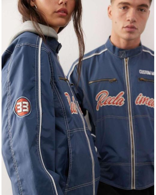 Reclaimed Vintage Blue Unisex Nylon Motor Jacket With Logo Badges And Embroidery