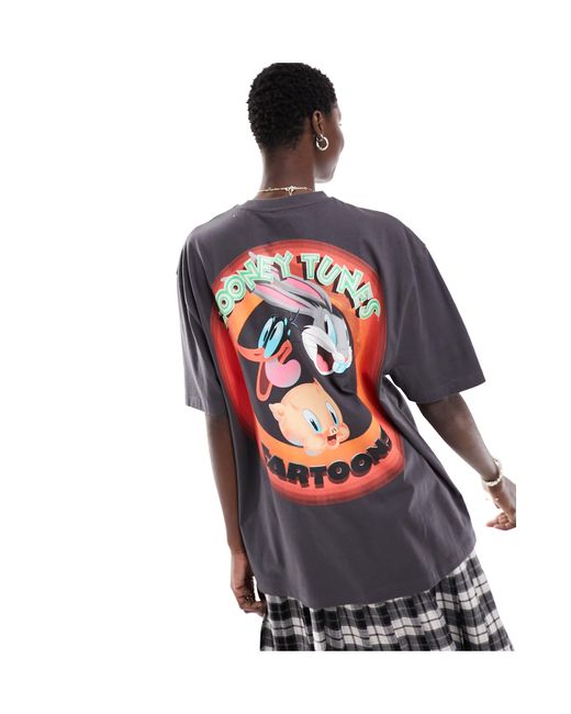 T-shirt oversize unisex antracite con grafica "looney tunes" su licenza sul retro di ASOS in Gray