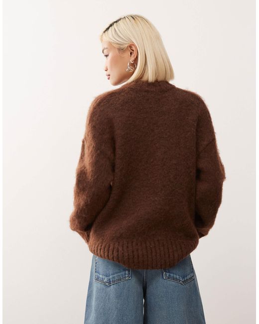 Pull ras Monki en coloris Brown