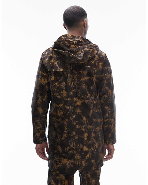 Rains – 12020 – wasserdichte unisex-longline-jacke mit kapuze und abstraktem, verschwommenem muster in Black für Herren