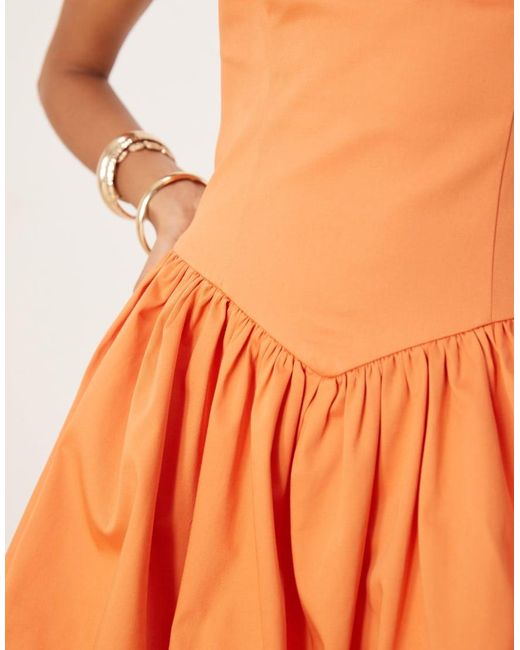Vestido Corto Con Escote Palabra De Honor, Cintura Baja Y Bajo Abullonado De Mezcla De Algodón De Mango de color Orange