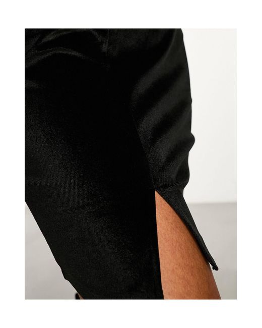 Minifalda negra con abertura en el bajo Monki de color Black