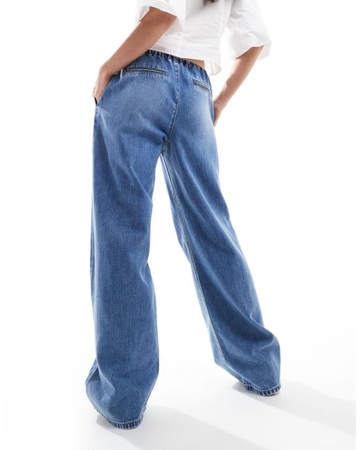 Str - jeans a fondo ampio con allacciatura elasticizzata di Stradivarius in Blue