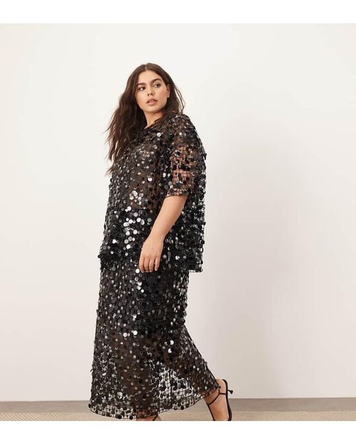 ARRANGE Black Curve Sheer Grid Sequin Maxi Skirt Co Ord