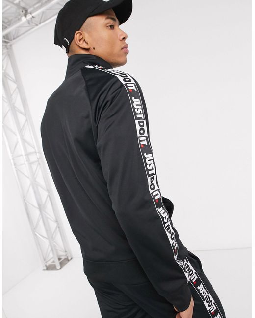 nike repeat pack logo taping polyknit tracksuit in black