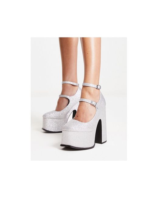 Natelle - chaussures à talon avec semelle plateforme - à paillettes Shellys London en coloris White