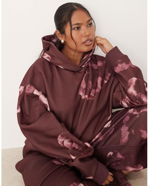 Asos design curve - sweat à capuche d'ensemble avec motif fleurs intégral - prune ASOS en coloris Red
