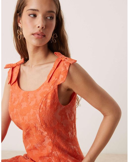 Sister Jane Orange Bow Shoulder Jacquard Mini Dress