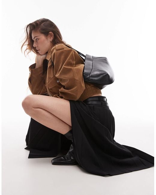 Jupe plissée mi-longue fendue devant Mango en coloris White