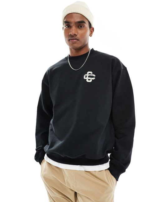 The Couture Club Black Cracked Print Emblem Sweatshirt for men