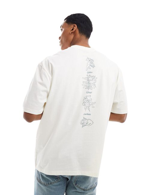 T-shirt oversize à imprimé chérubin sur la colonne ASOS pour homme en coloris White