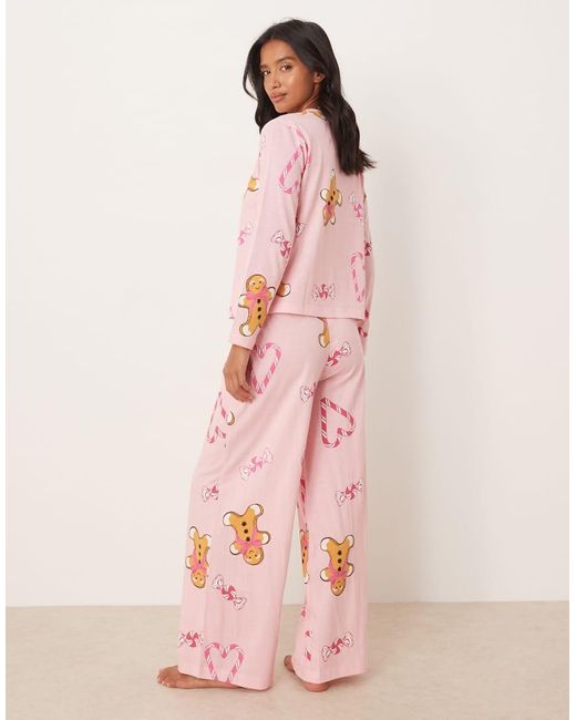 ASOS Pink Asos Design Petite Gingerbread & Candy Cane Long Sleeve Top & Trouser Pyjama Set