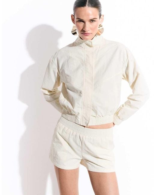 The Frolic White Exclusive Nylon Track Shorts Co-ord