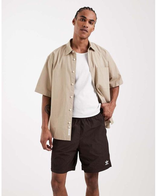 Adidas Originals Natural Trefoil Essentials Woven Shorts for men