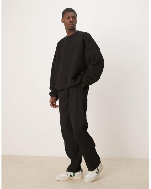 ASOS – schmal zulaufende plissee-jogginghose in Black für Herren