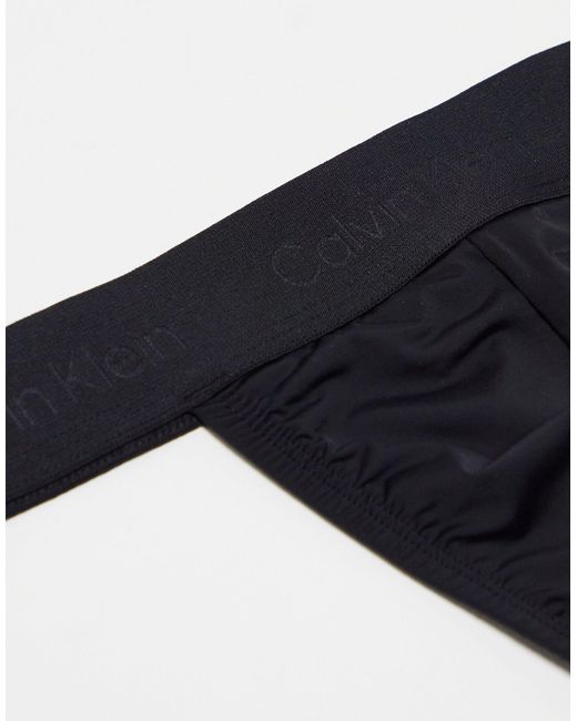 Calvin Klein – figurformender spitzen-tanga in Black für Herren