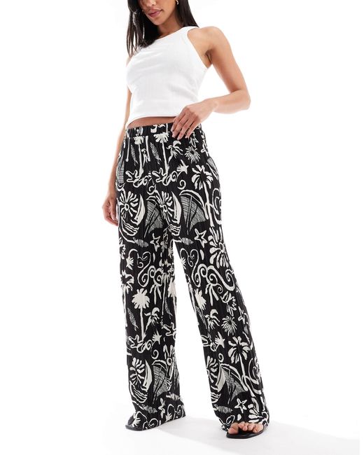 Vero Moda White – plissee-hose mit hohem bund, weitem bein und tropischem muster
