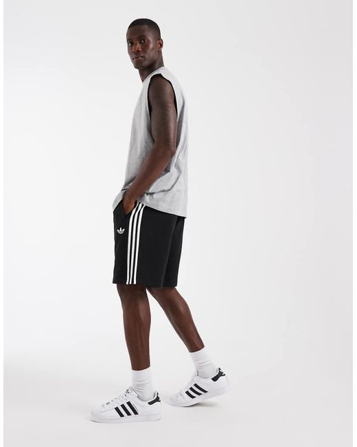 Adidas Originals Gray Three Stripe Shorts for men