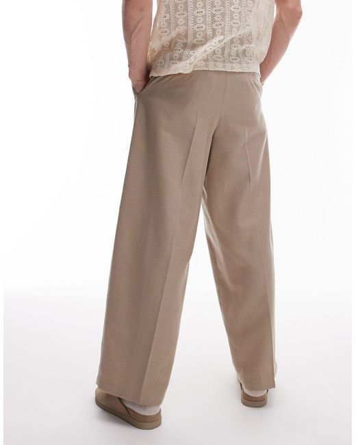 Pantaloni a fondo ampio color pietra testurizzato di Topman in Natural da Uomo