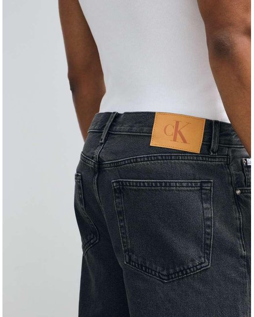 Calvin Klein Black Essential Relaxed Wide Leg Jeans for men