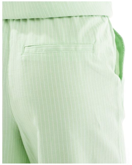 Pantalon d'ensemble large - clair à fines rayures Jdy en coloris Green