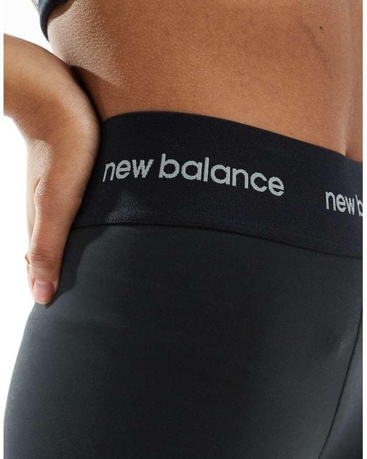 New Balance Black Linear Logo Sleek 25 Inch High Rise leggings