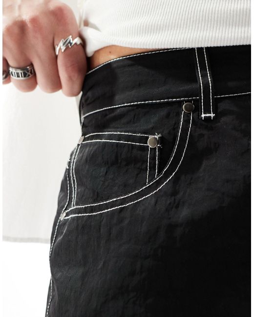 Pantalones cortos s estilo vaqueros con detalles en contraste ASOS de hombre de color Black
